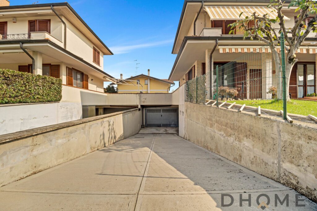 Ampio parcheggio sotterraneo per residenze DHOME a Verona.