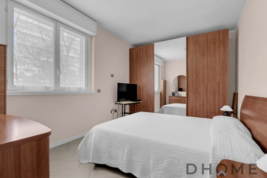 Appartamento con giardino privato e box auto a Pessano Con Bornago.