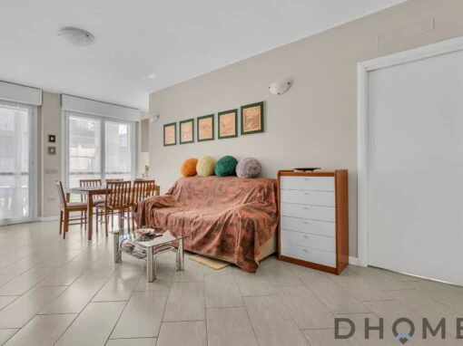 Appartamento trilocale in vendita a Pessano Con Bornago, con giardino privato e box auto incluso.