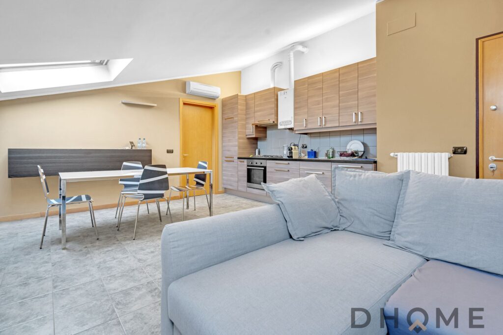 Appartamento bilocale in affitto a Maciachini, ultimo piano, con arredi moderni e luminosi.